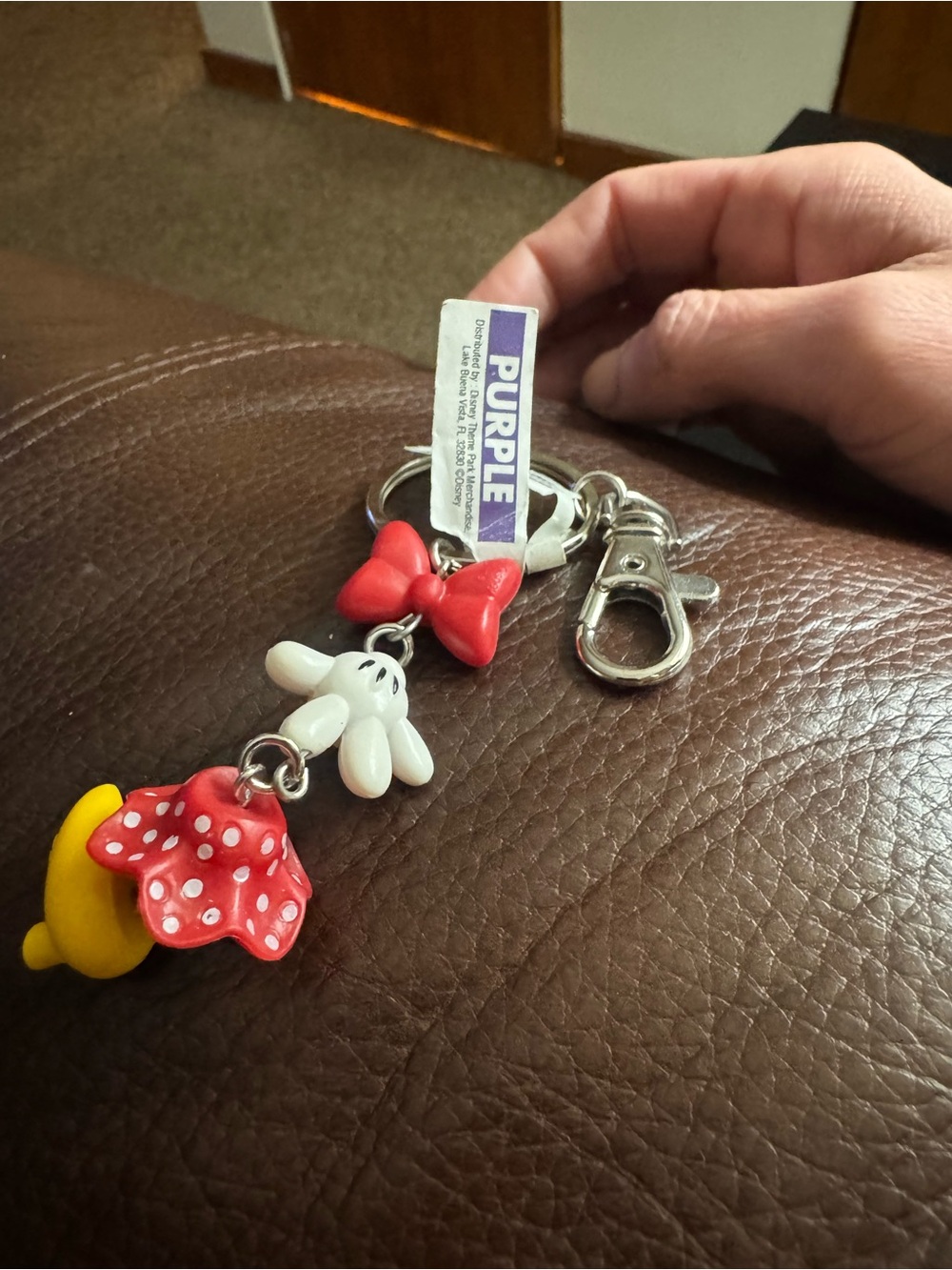 Cute Character Keychain with Red Bow and Yellow Charm Disney exclusive